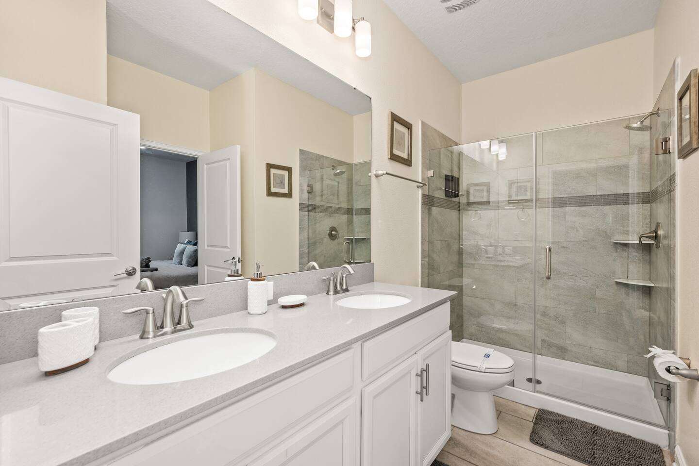 Ensuite bathroom with double vanity and glass walk-in shower