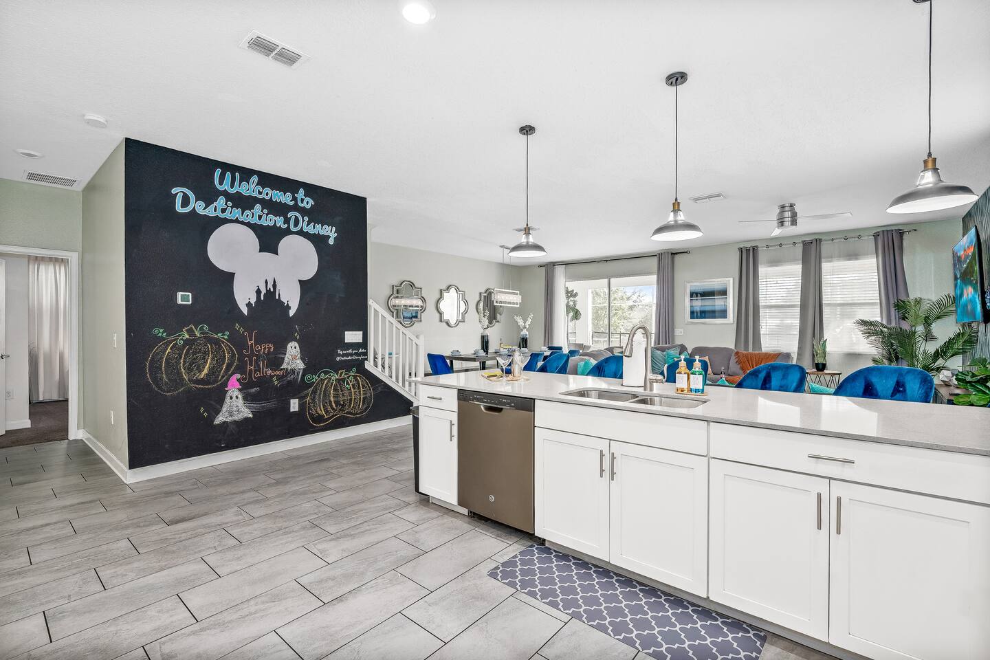 Welcome to Destination Disney chalkboard mural greeting guests at the entry