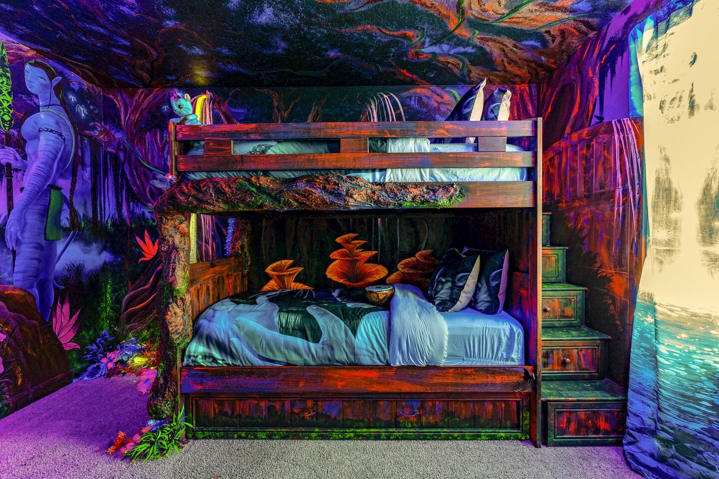 Avatar room's carved-tree bunk bed with trundle, sleeping up to six