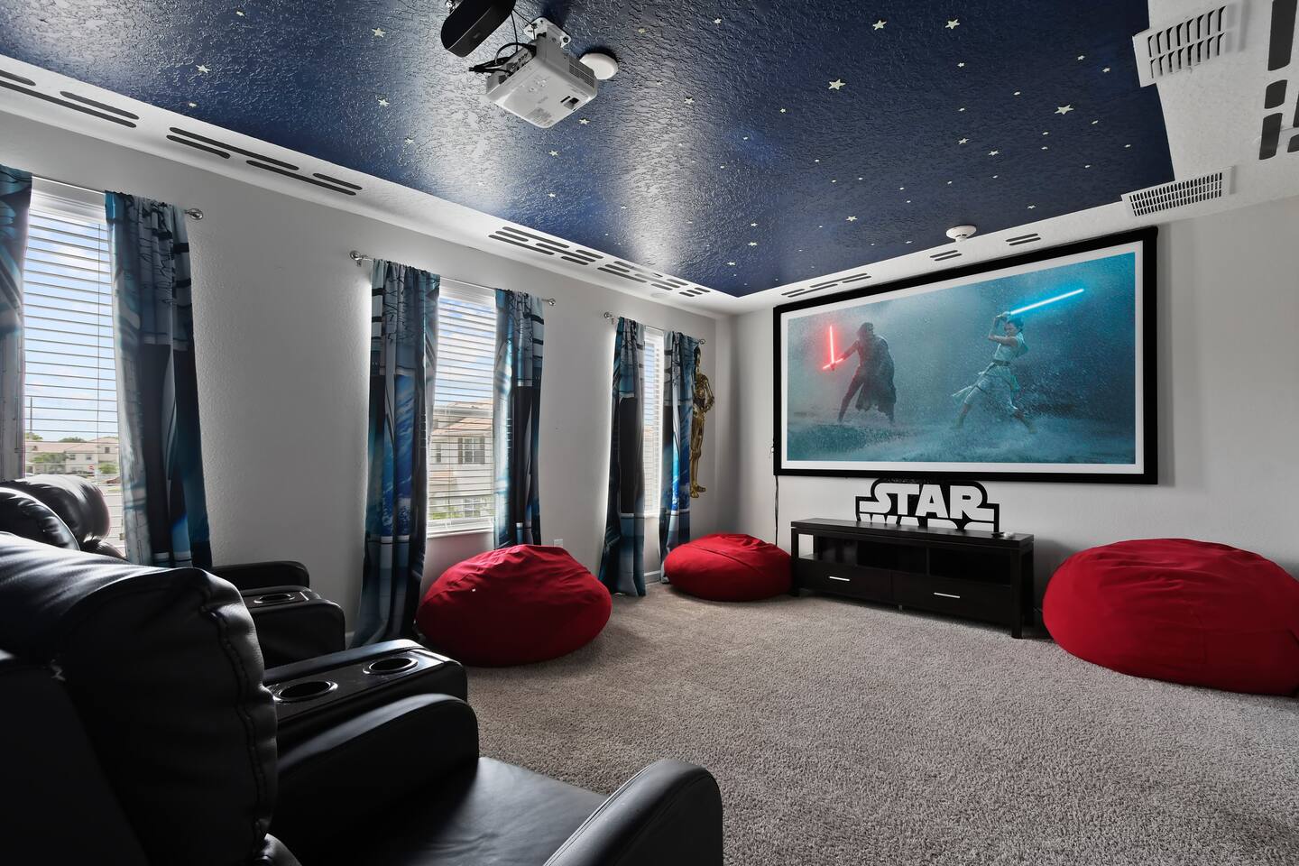 The home theater with 100" screen is an awesome way to freshen up on a Disney or