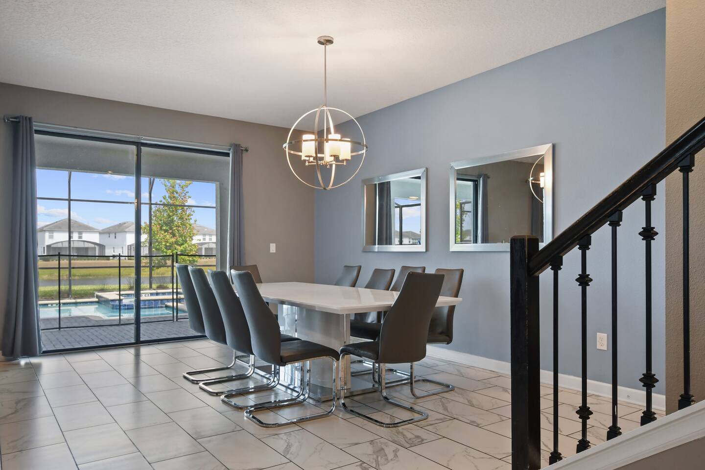 Dining table for ten with sliding doors to the pool