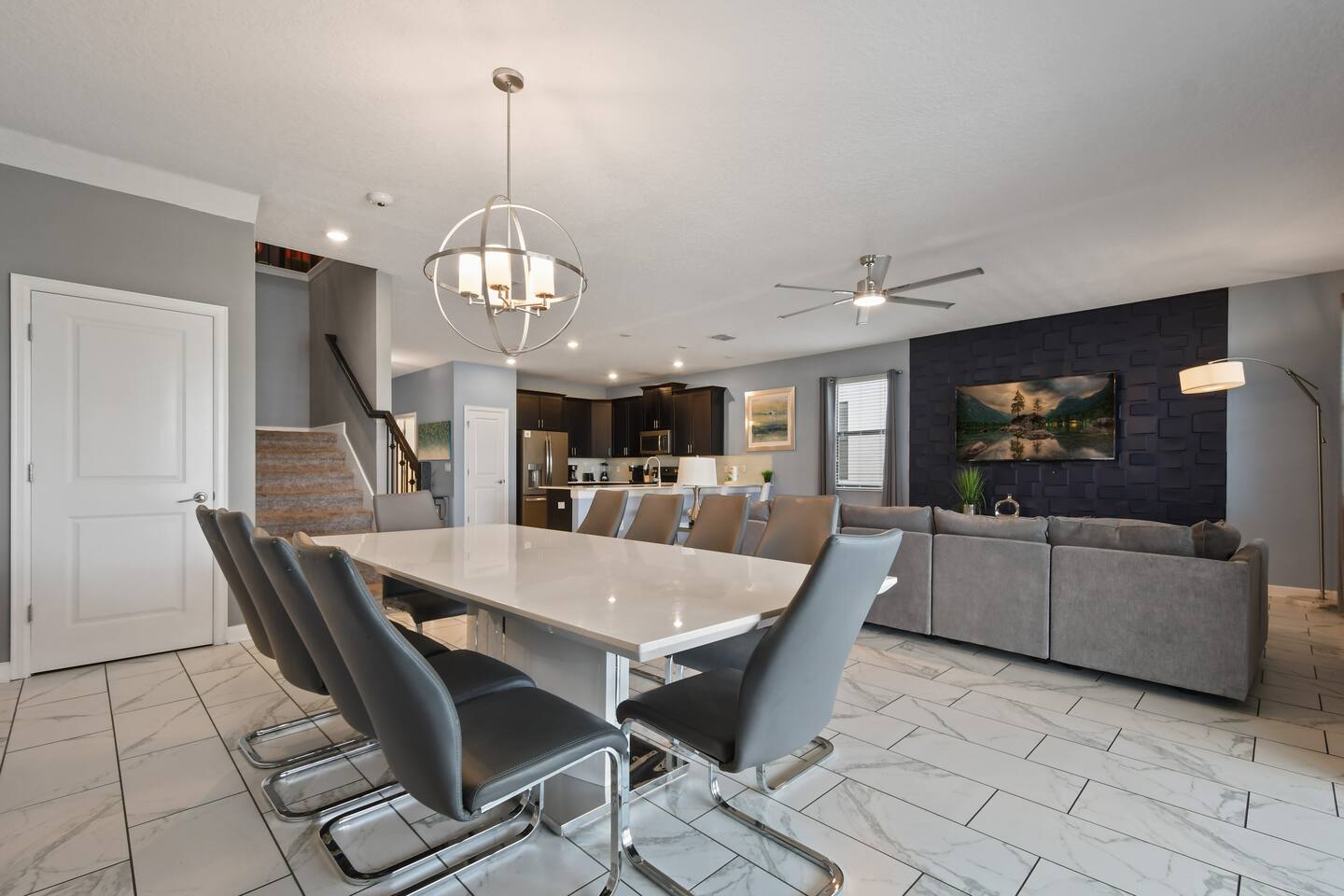 Dining table seating ten in the open-plan main living space