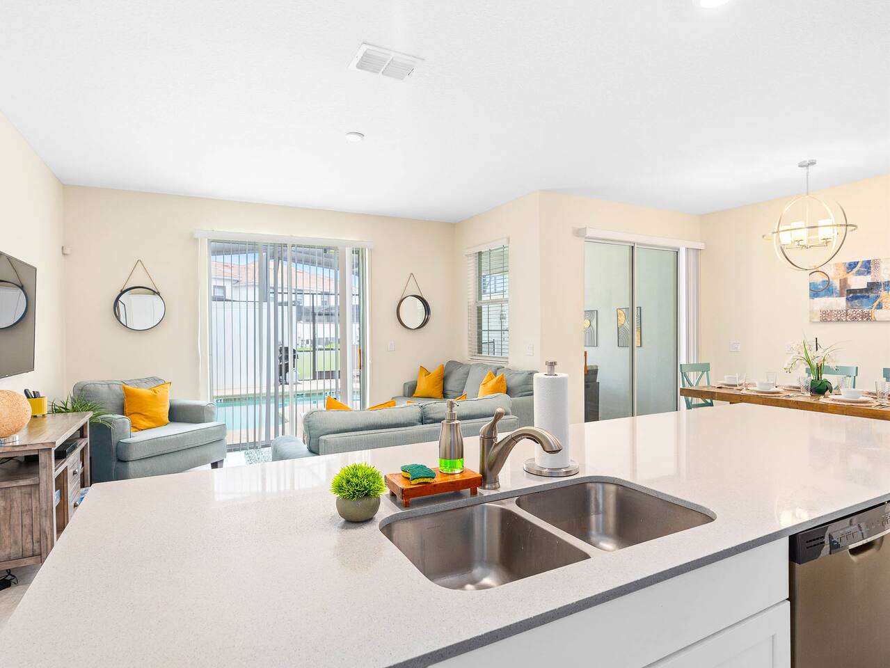 njoy bright, stylish seating and seamless indoor-outdoor living by the pool!