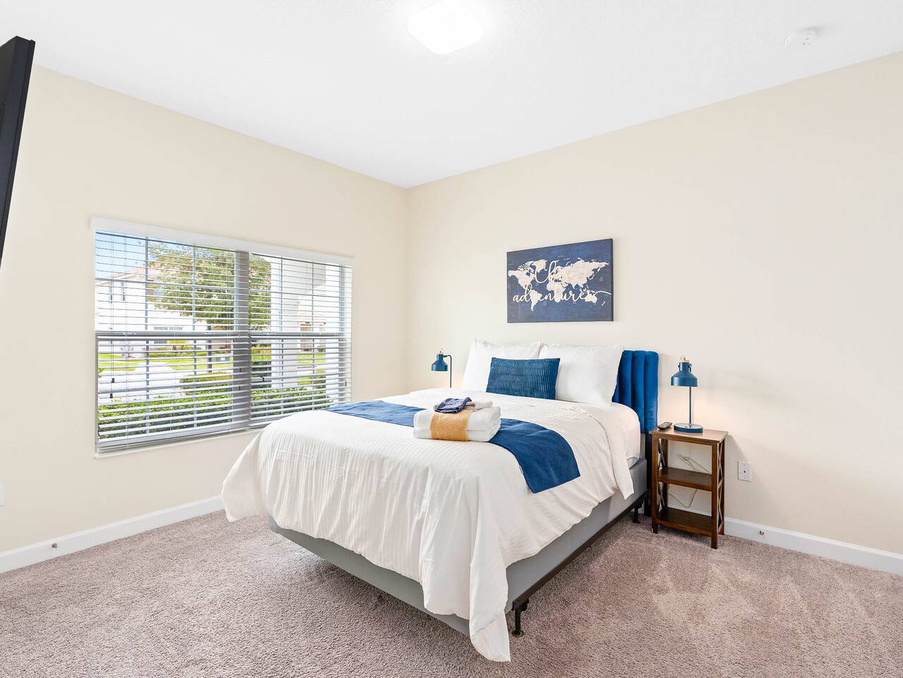 Bright room with comfy bed, stylish decor, and lovely views for ultimate relaxat