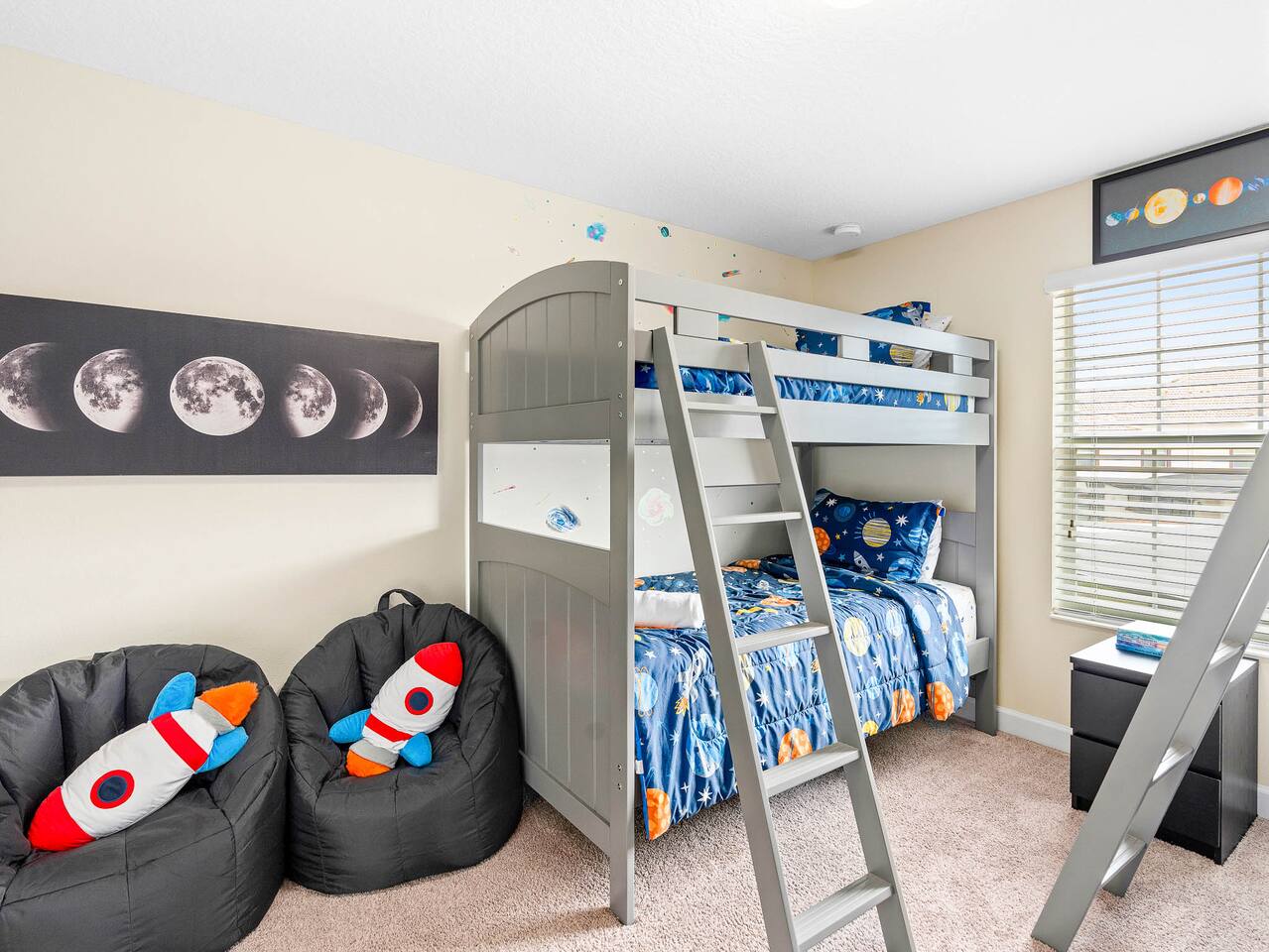 Kids' Space: Blast off in this adventurous room featuring a bunk bed and playful