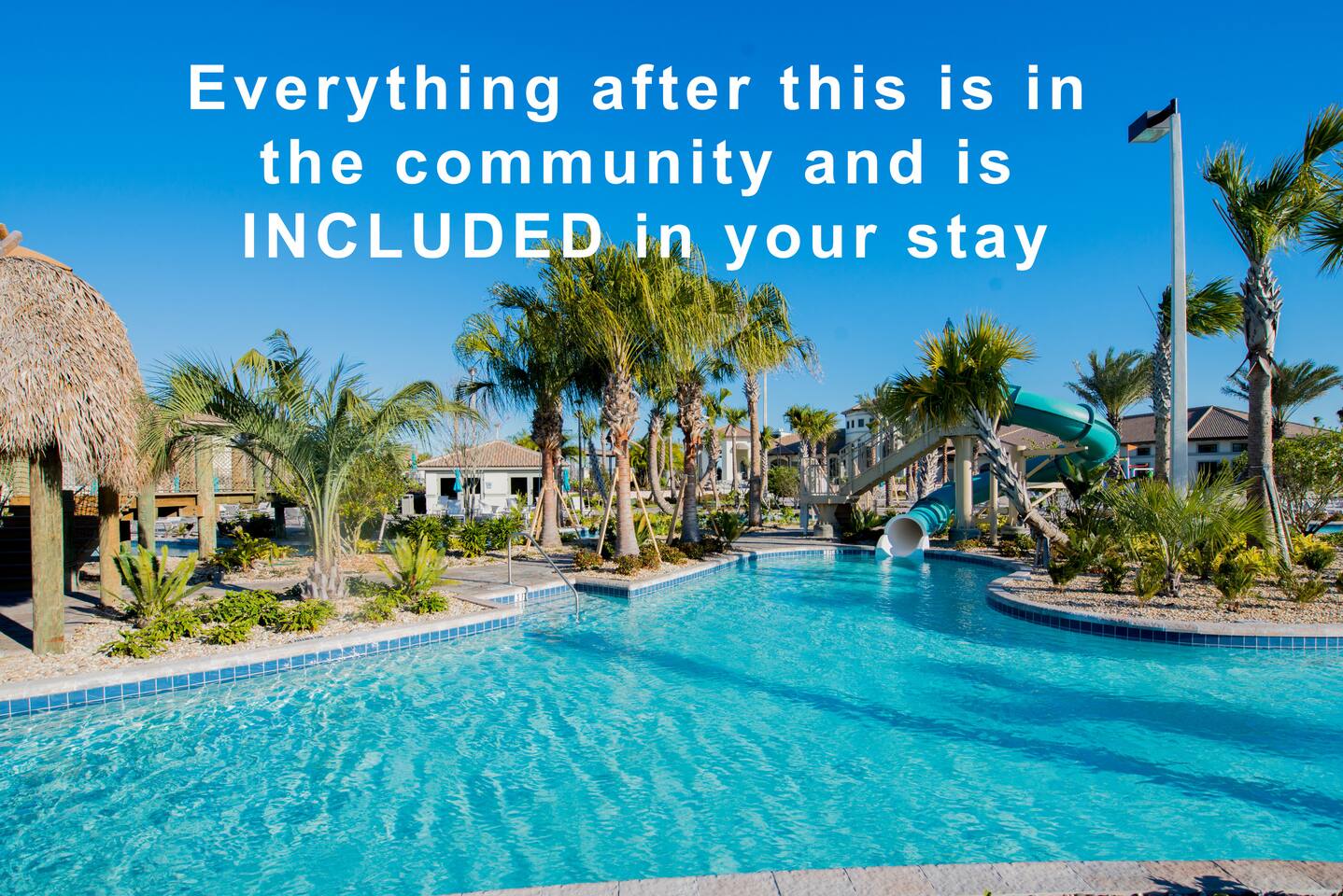 Community Pool Paradise: Dive into fun with slides, sun, and palm-fringed relaxa