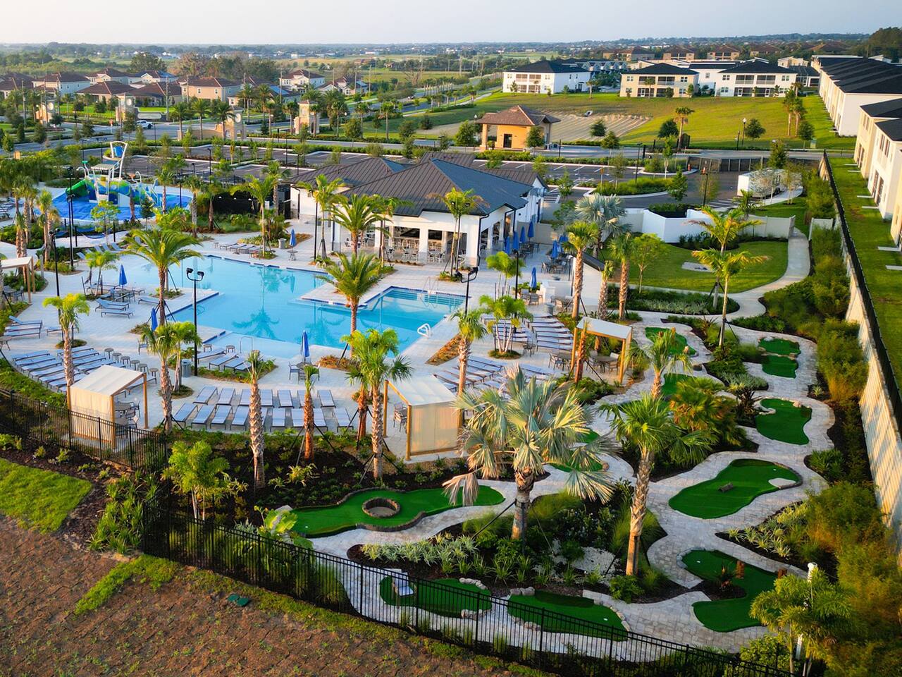 Resort-Style Pool and Mini Golf: Dive into fun with a sparkling pool and lush gr