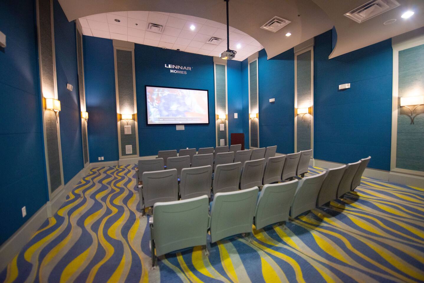 Theater Room: Enjoy movie nights in style with plush seating and a big-screen ex
