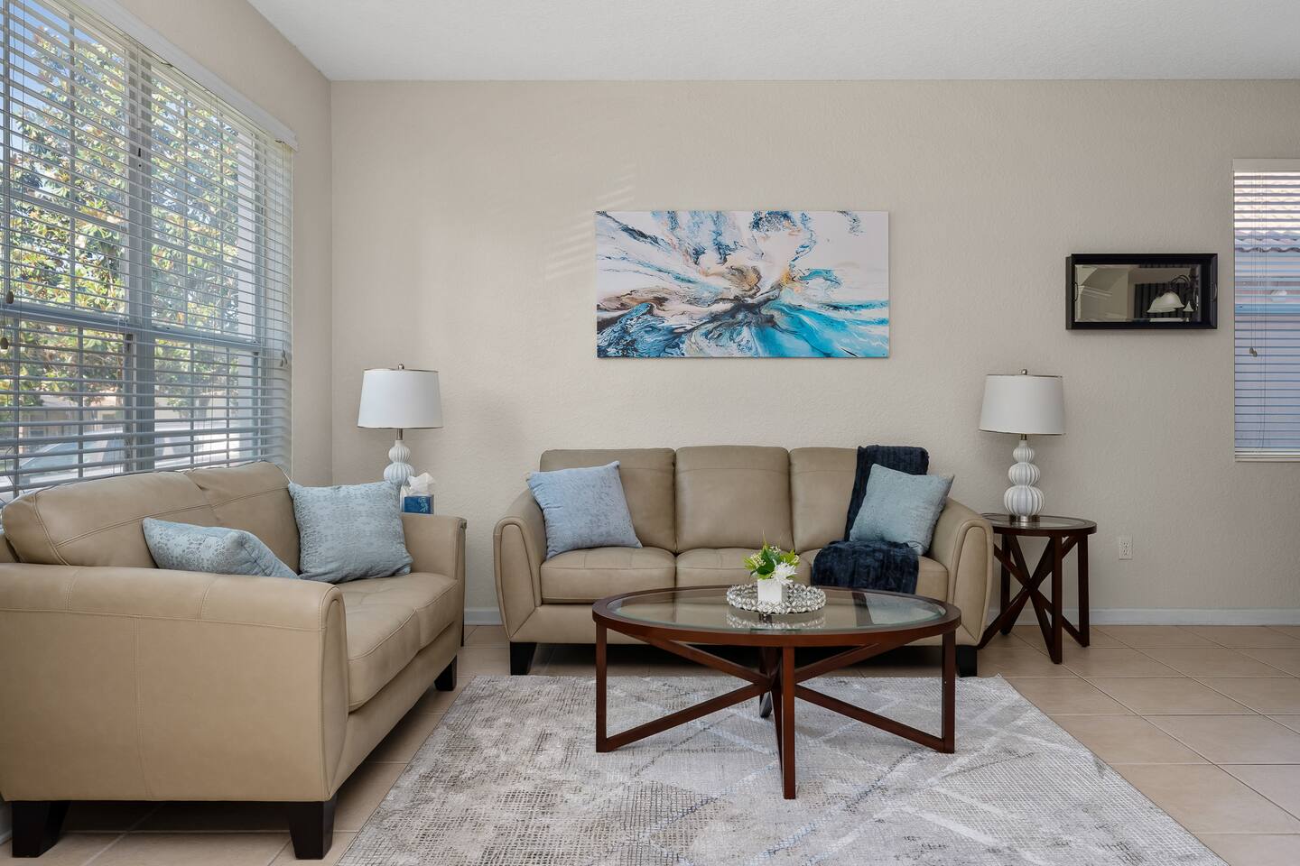 Living Room: Sun-drenched retreat with stylish seating and colorful decor for re
