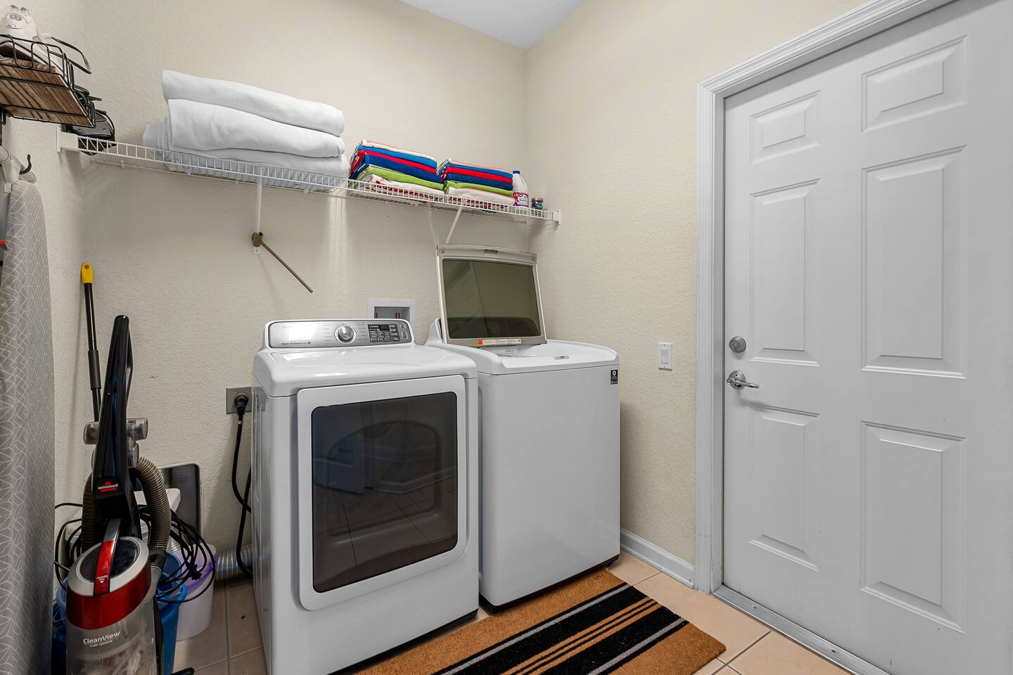 Laundry Room: Convenient appliances and ample storage for all your essentials!