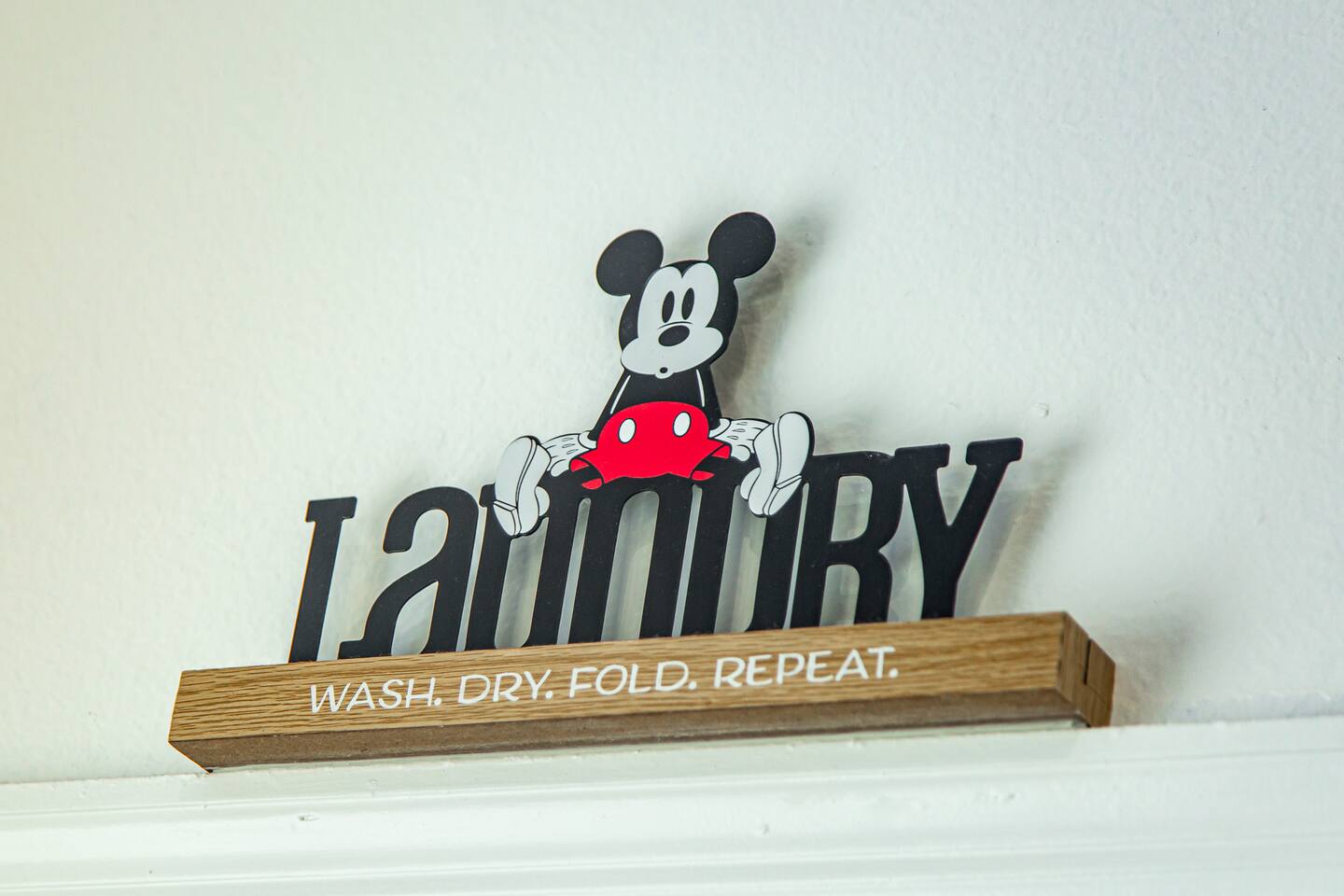 Mickey Mouse Laundry wall sign.