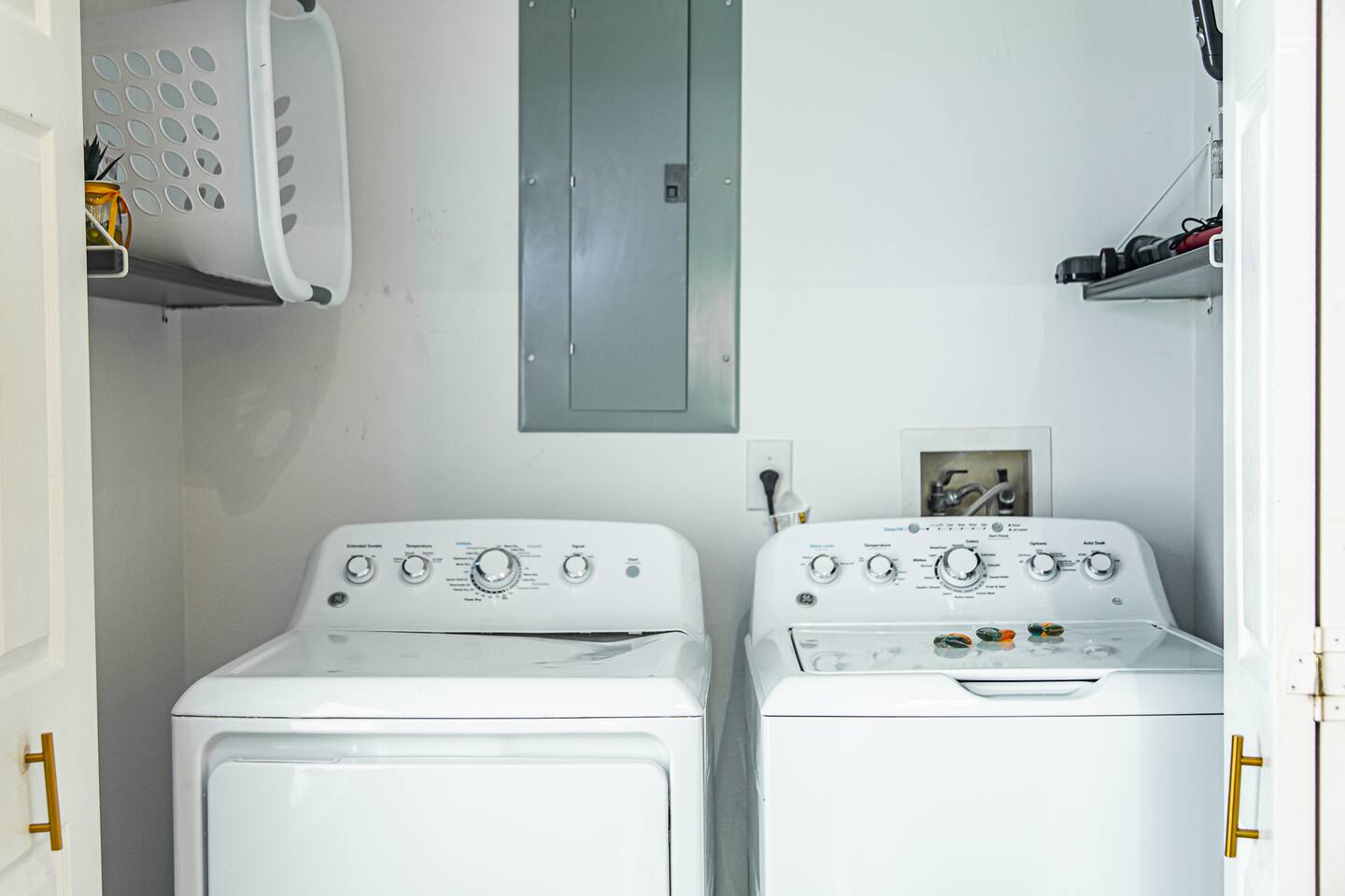 Laundry area with a full-size washer and dryer.