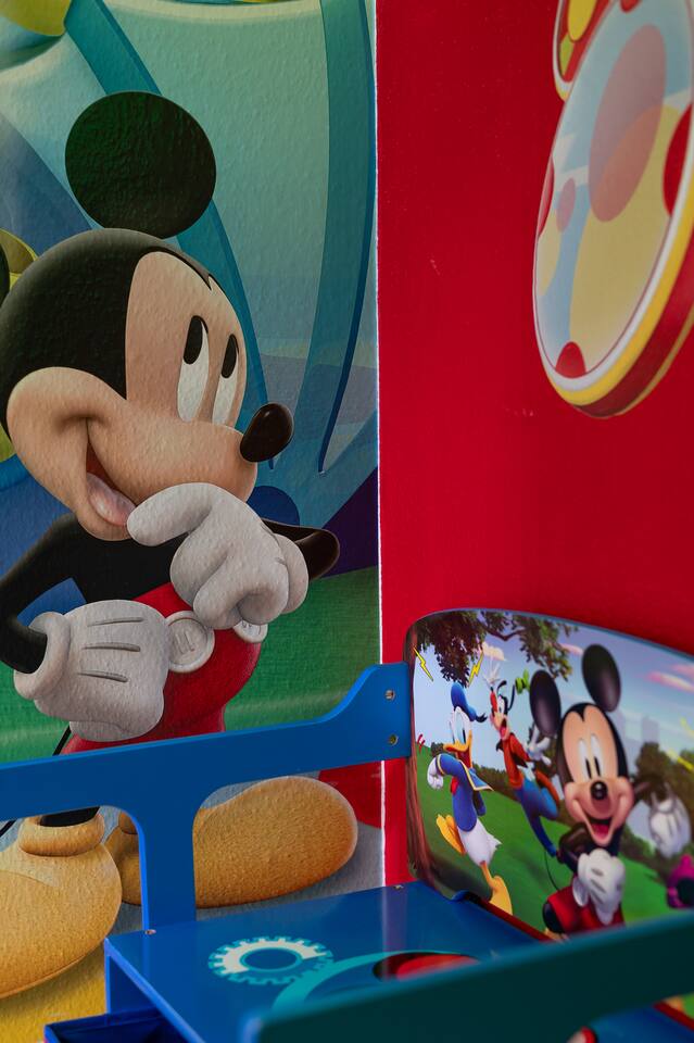 Clubhouse friends greet the smallest guests in the toddler play nook.