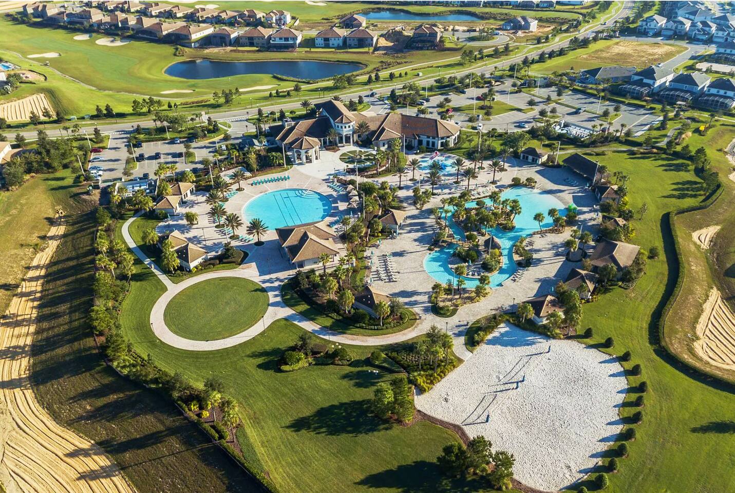 Aerial view of the nearby Oasis Club: resort pools, lazy river and clubhouse.