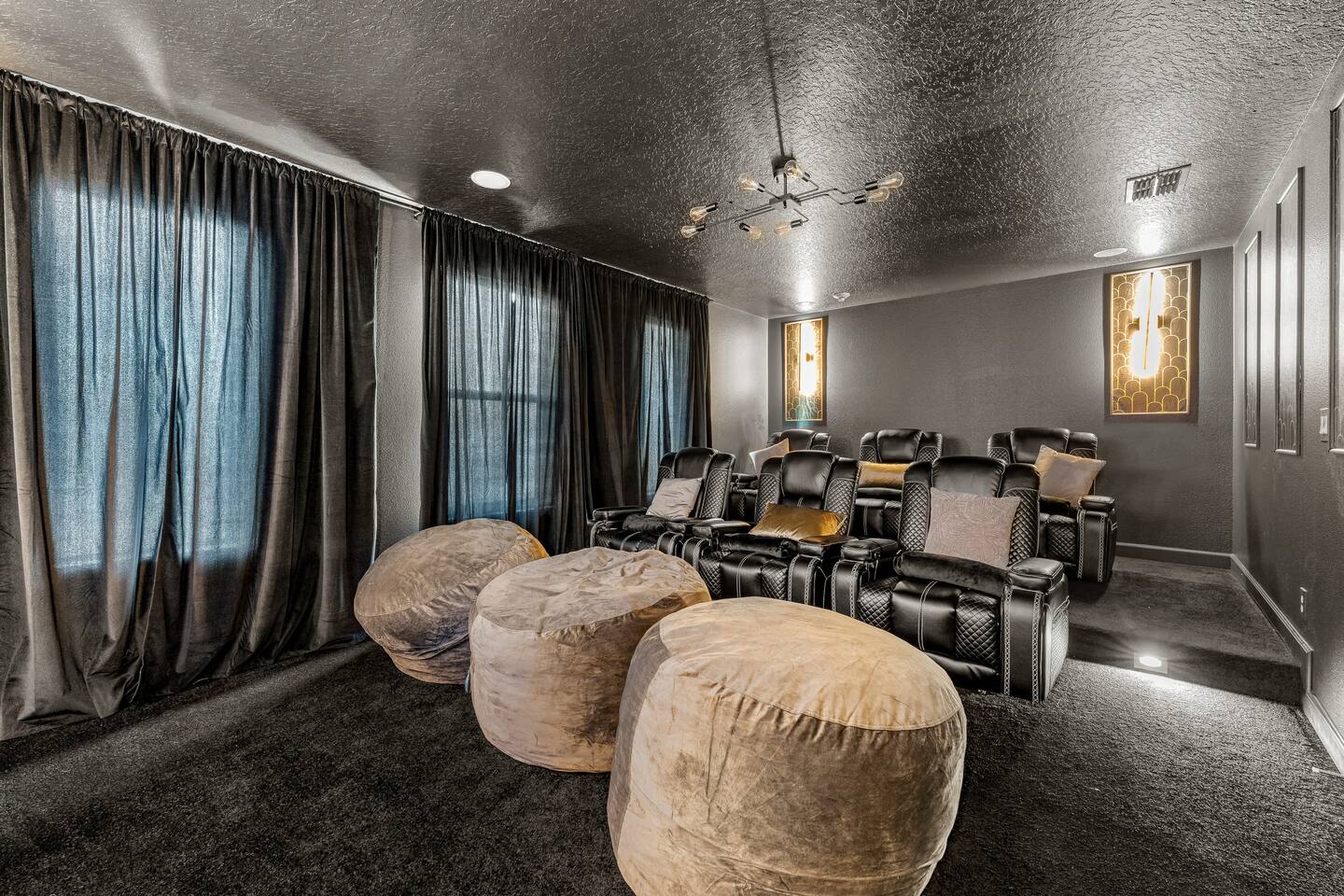 Home theater with reclining seats and oversized bean bag loungers