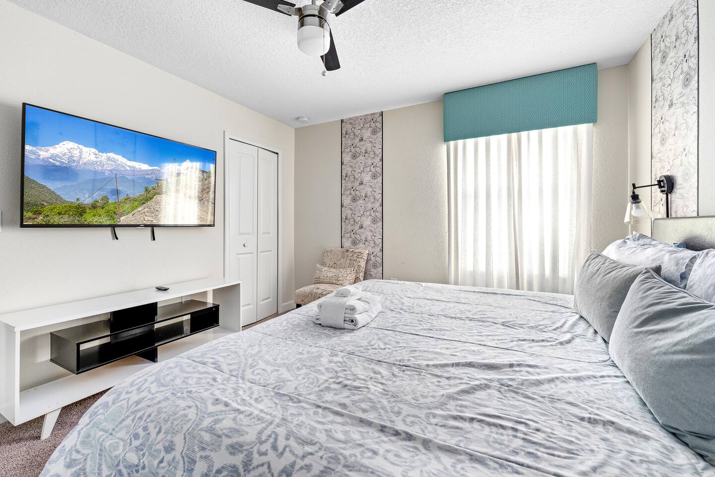 Bright retreat with luxurious bedding and stunning views to unwind after adventu