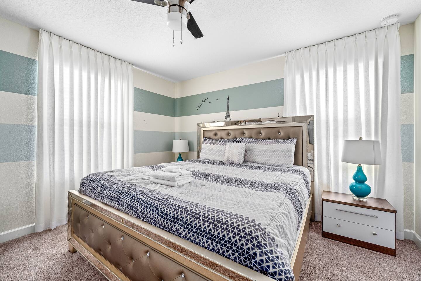 Bright stripes and elegant decor create a chic retreat for your Florida getaway!