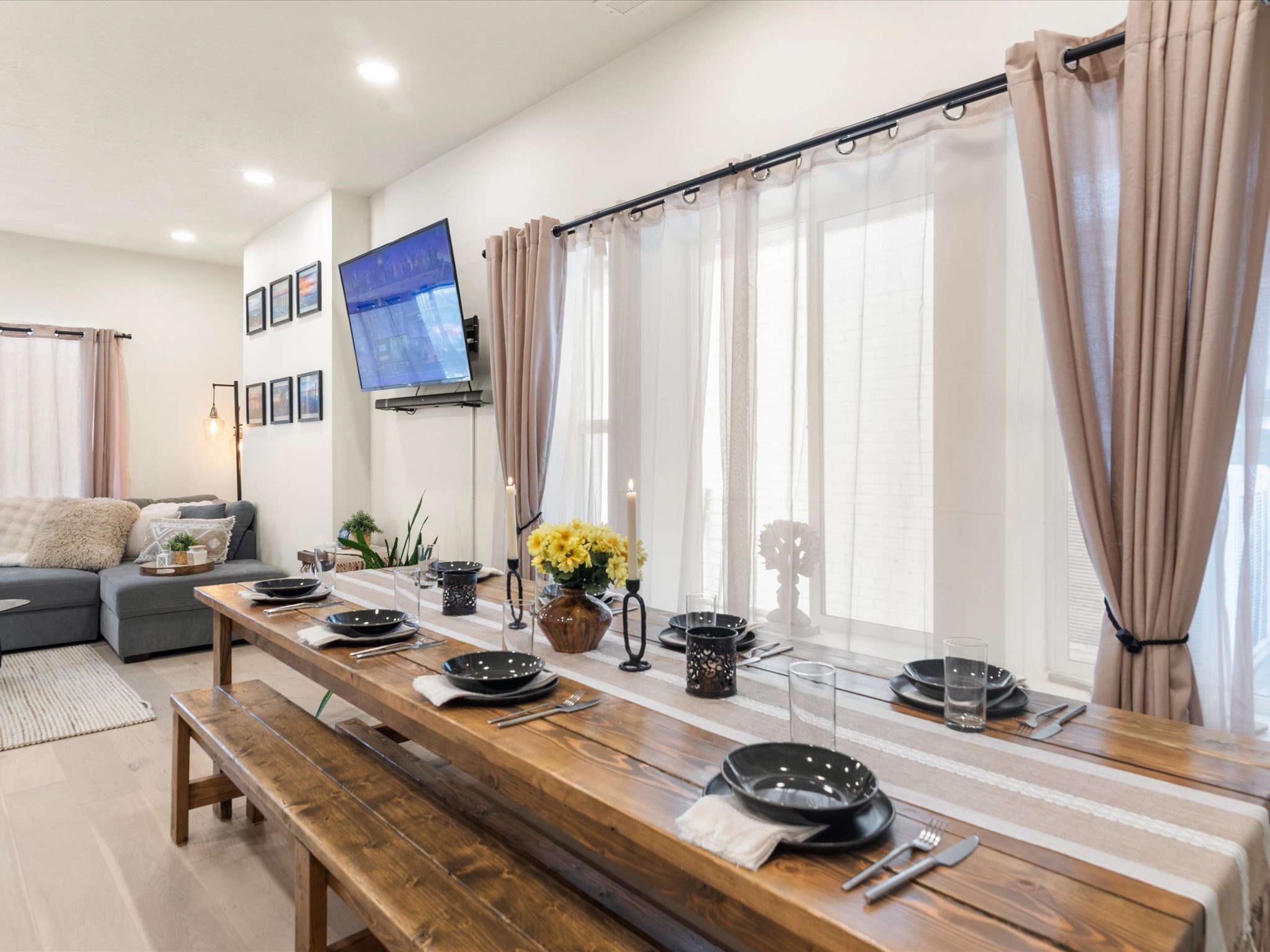 Dining table for eight with the living room lounge just beyond