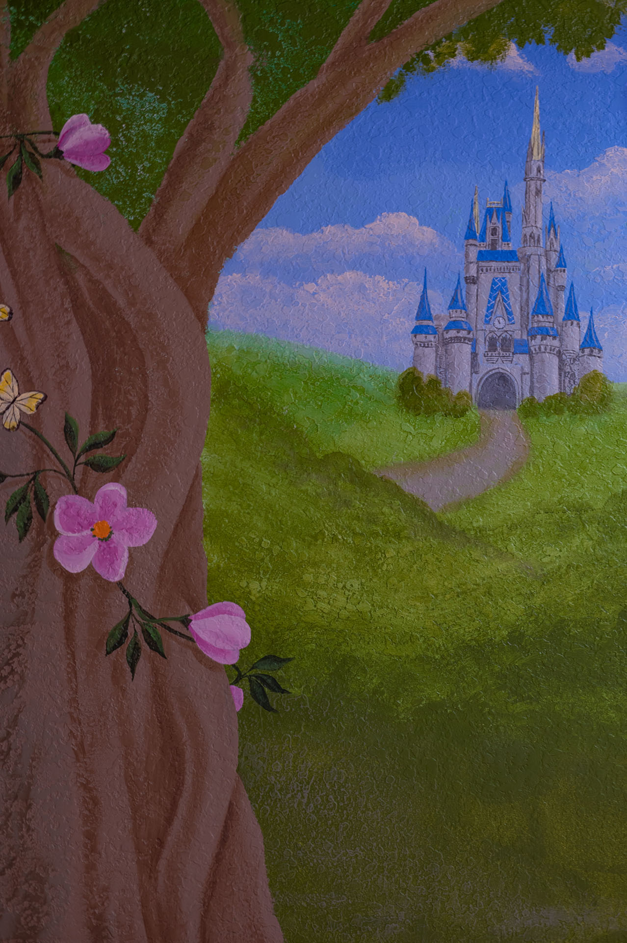 A castle on the hill — mural detail in the fairytale bedroom.