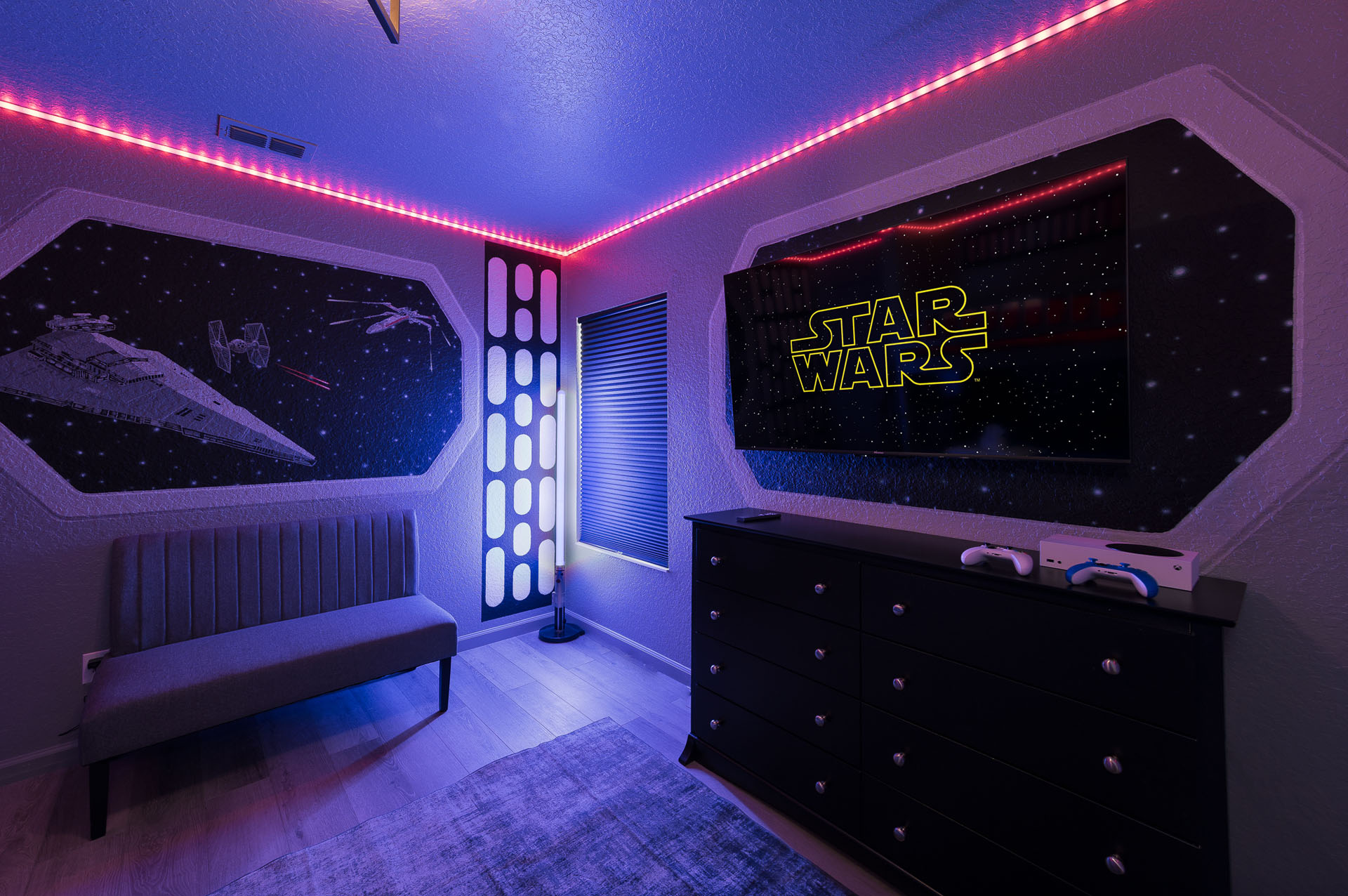 The Star Wars room comes with an Xbox Series S, two controllers, and a lightsabe