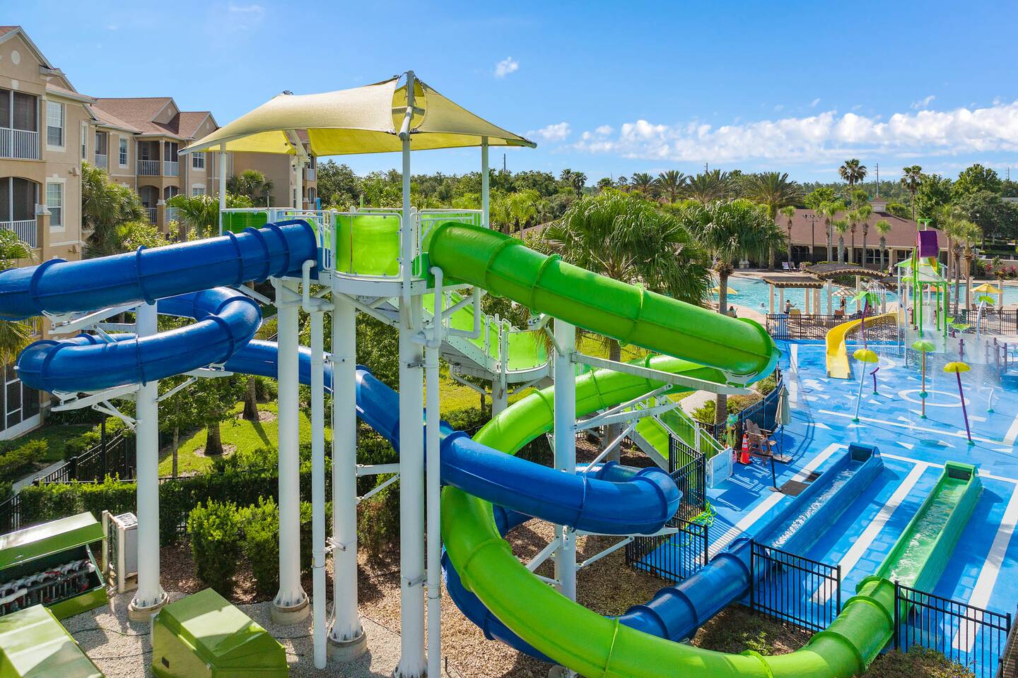 Twin water slides and splash pad at the Windsor Hills community water park.