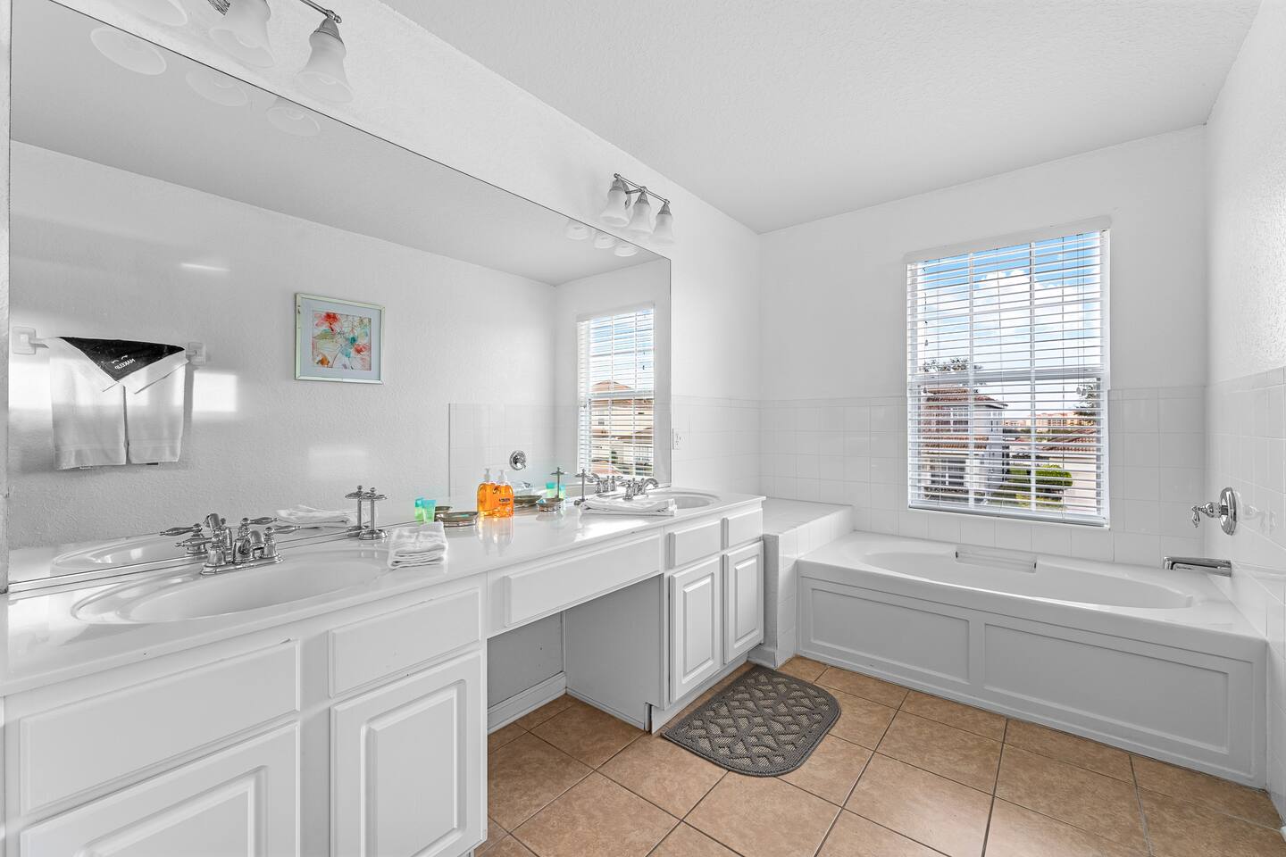 Relax in the luxurious tub in the master bathroom.