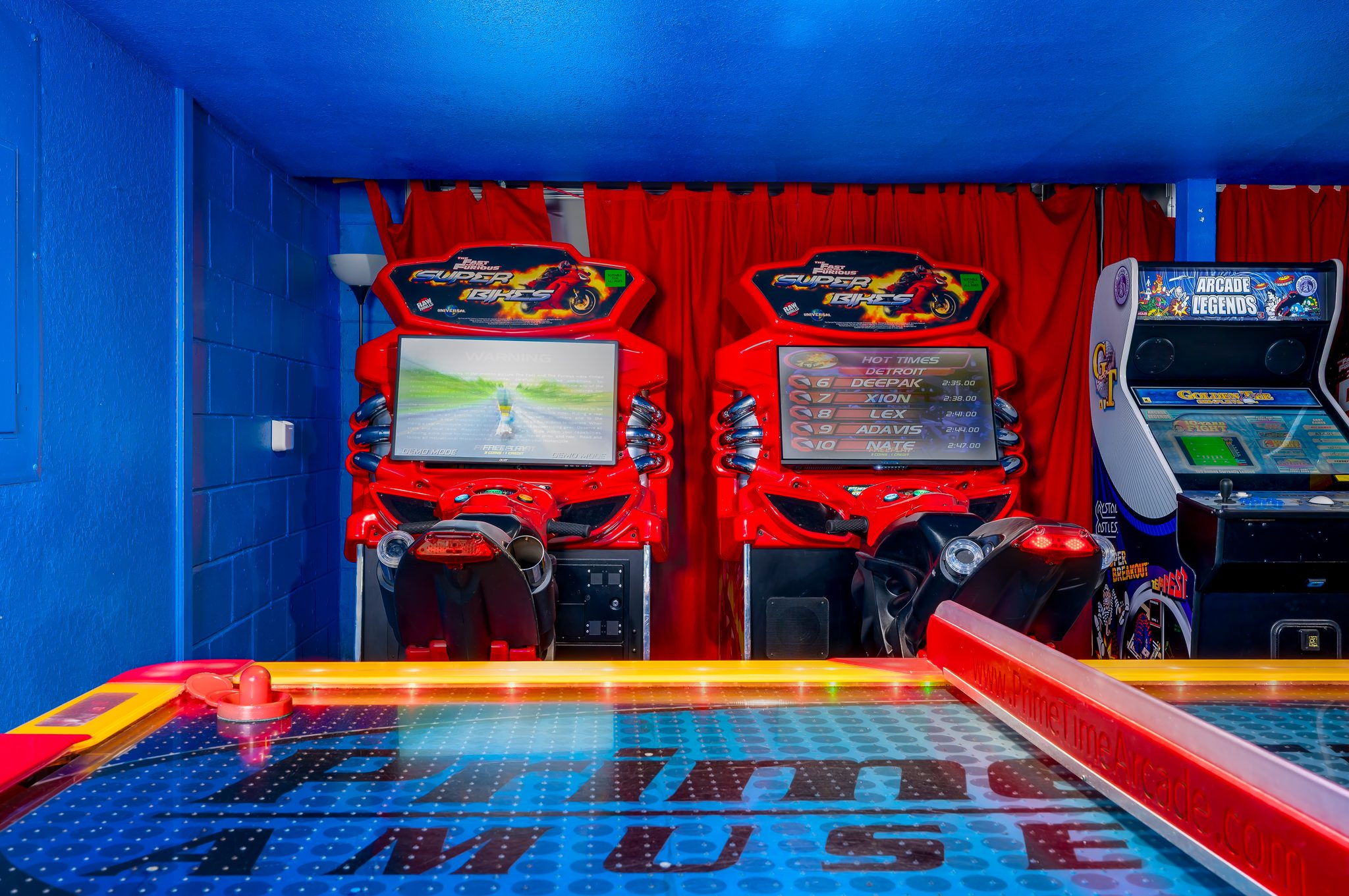 Vibrant game room with air hockey and retro arcade fun