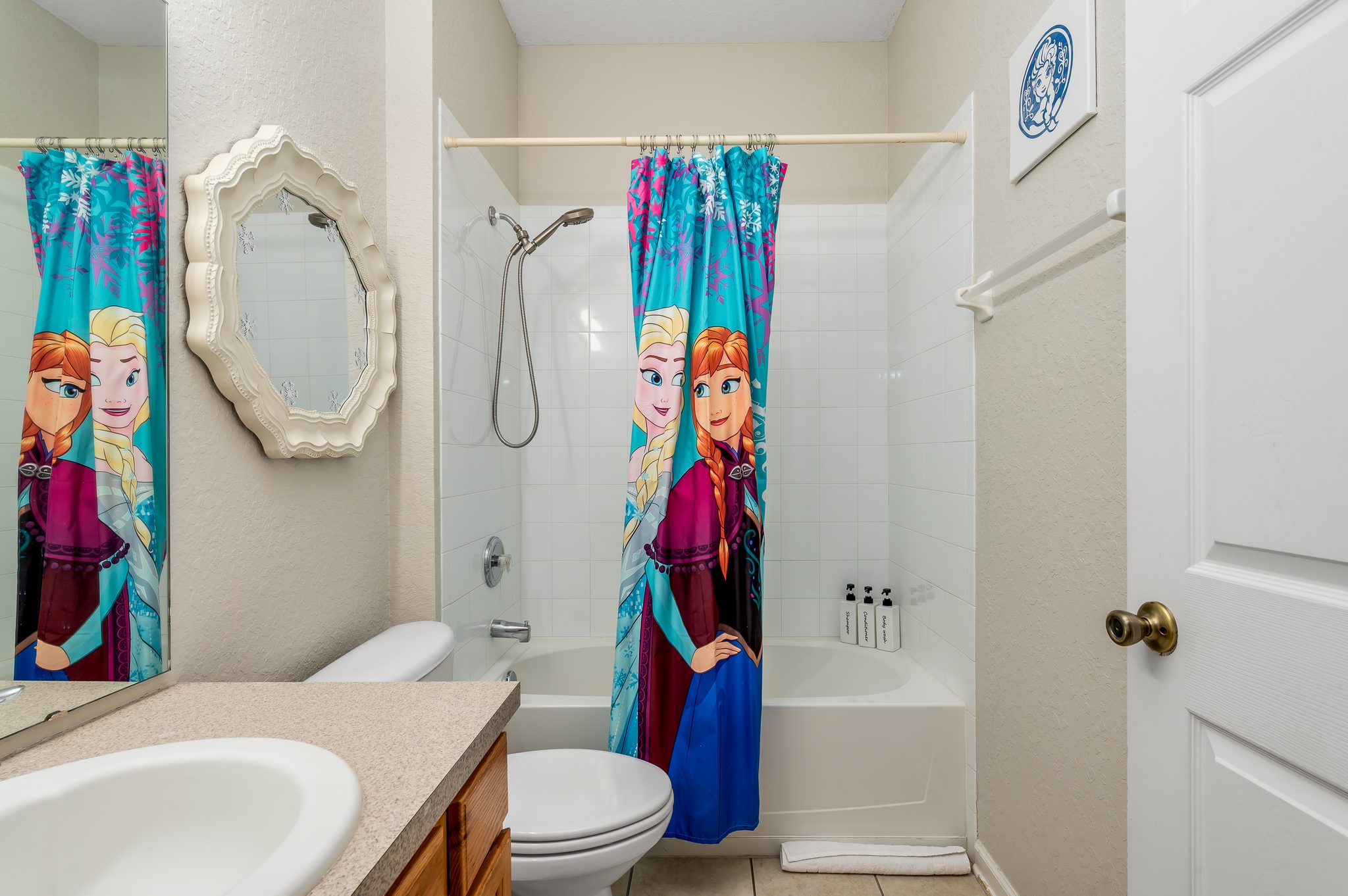 Frozen theme bathroom with tub/shower