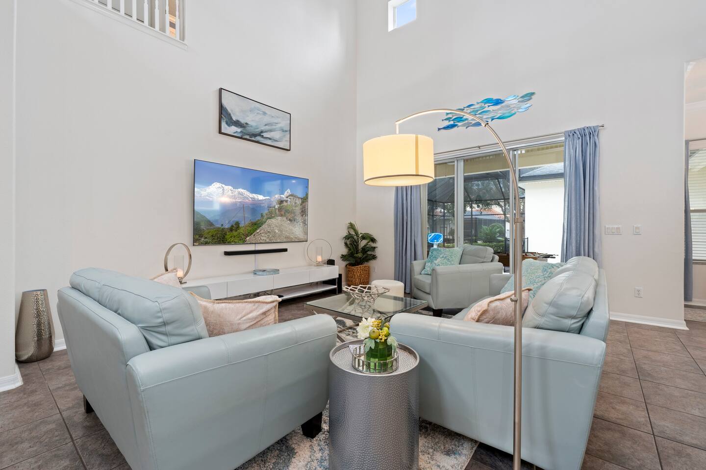 Bright and airy space with plush seating and a stunning TV for movie nights!