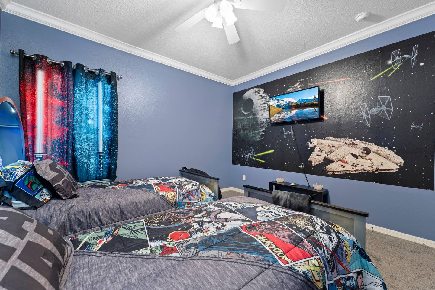 Dive into epic dreams with themed décor and vibrant designs in this room!