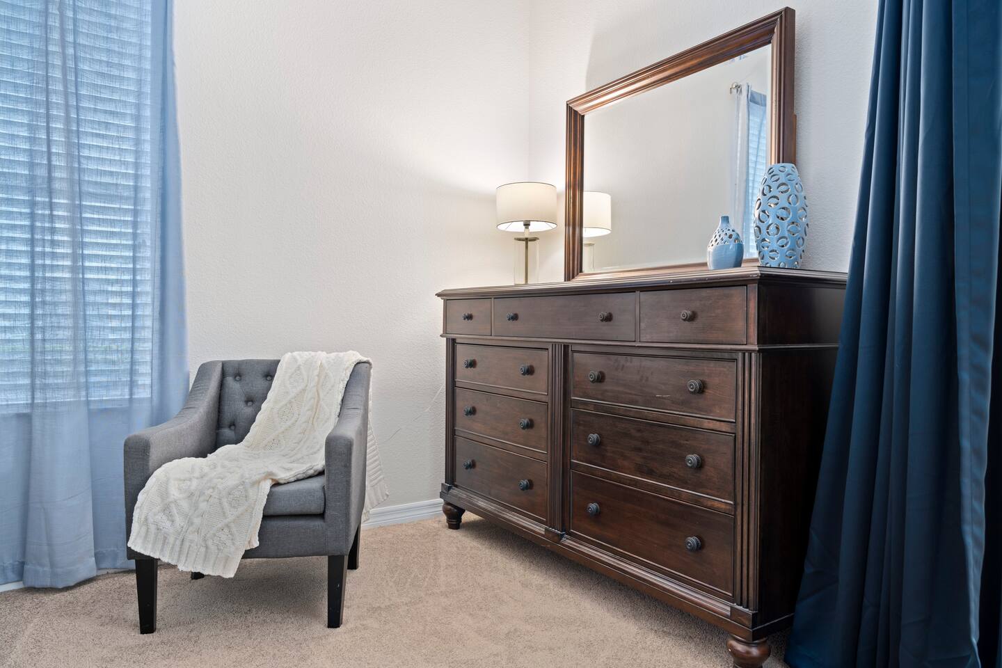 Enjoy serene moments in this stylishly decorated room with natural light and cha