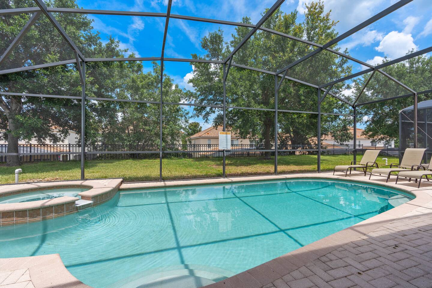 Dive into relaxation in your private pool surrounded by lush greenery!