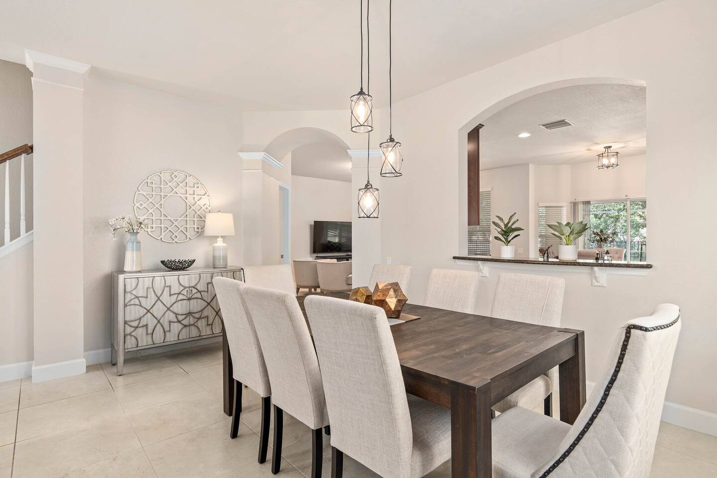 Gather around the stylish table and enjoy meals in a bright, inviting space!