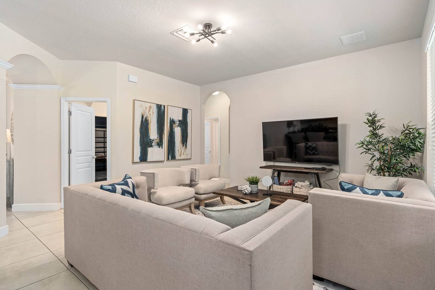 Stylish space to unwind with plush seating and a modern TV for movie nights!