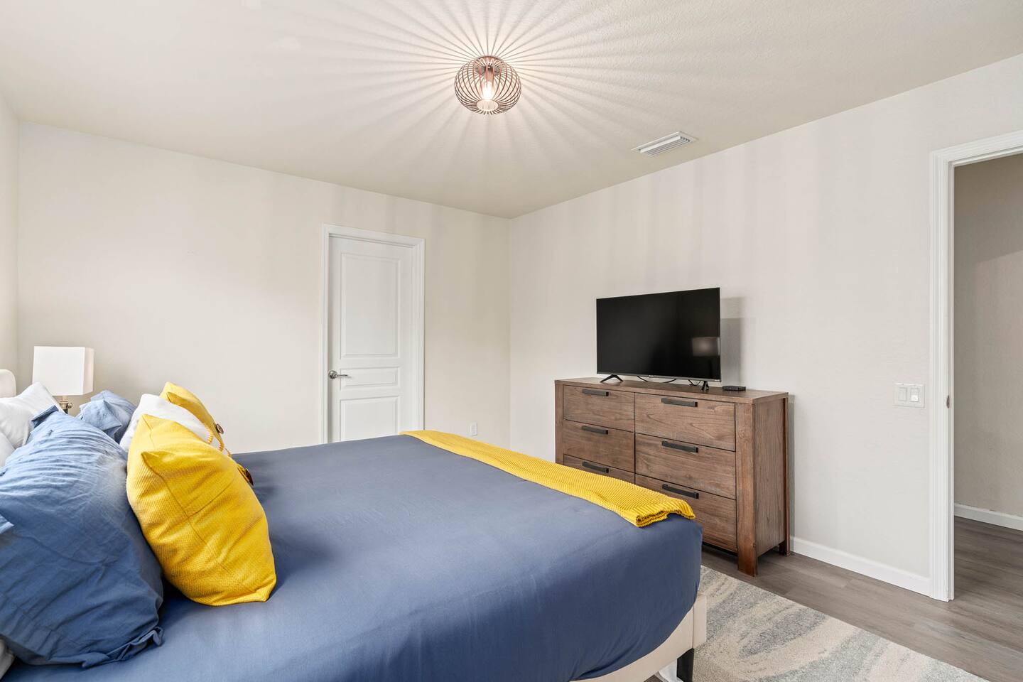 Sanctuary with plush bedding and stylish decor for a peaceful retreat!
