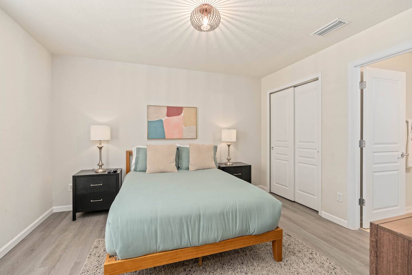 Modern retreat with stylish decor, warm lighting, and serene color palette!