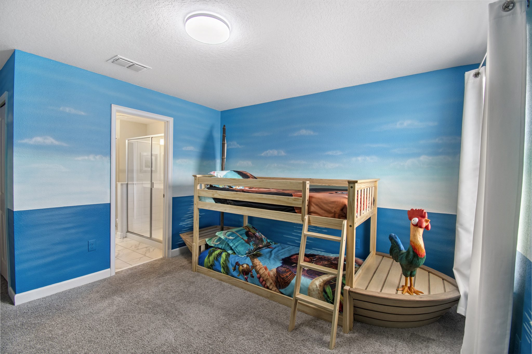 Upstairs: Moana-themed bedroom with TV