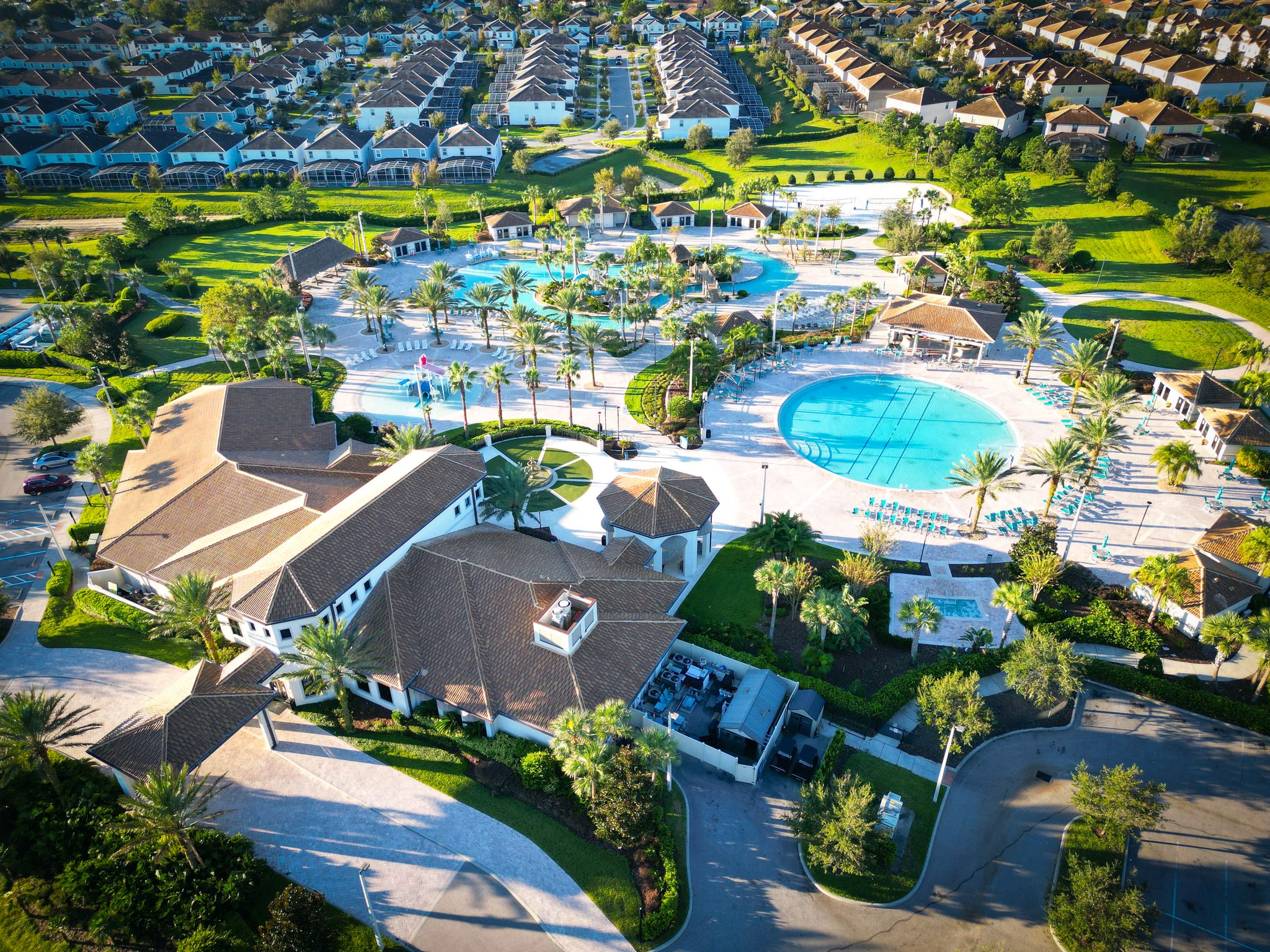 Resort access: aerial view of the resort clubhouse, pools, and lazy river