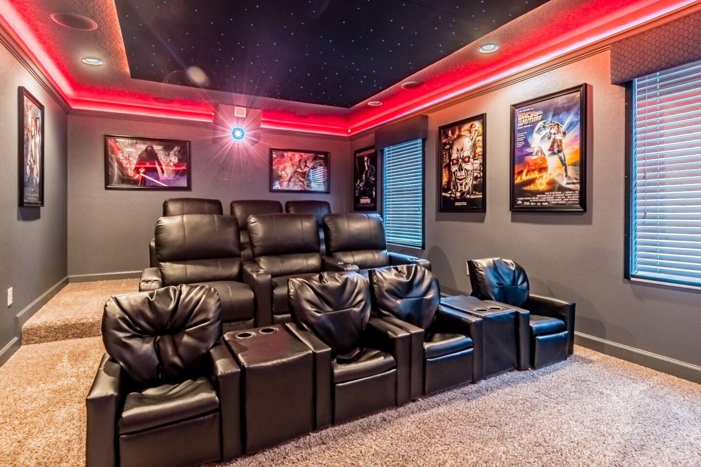 The movie theater has a high def projector and tiered and elevated movie theater