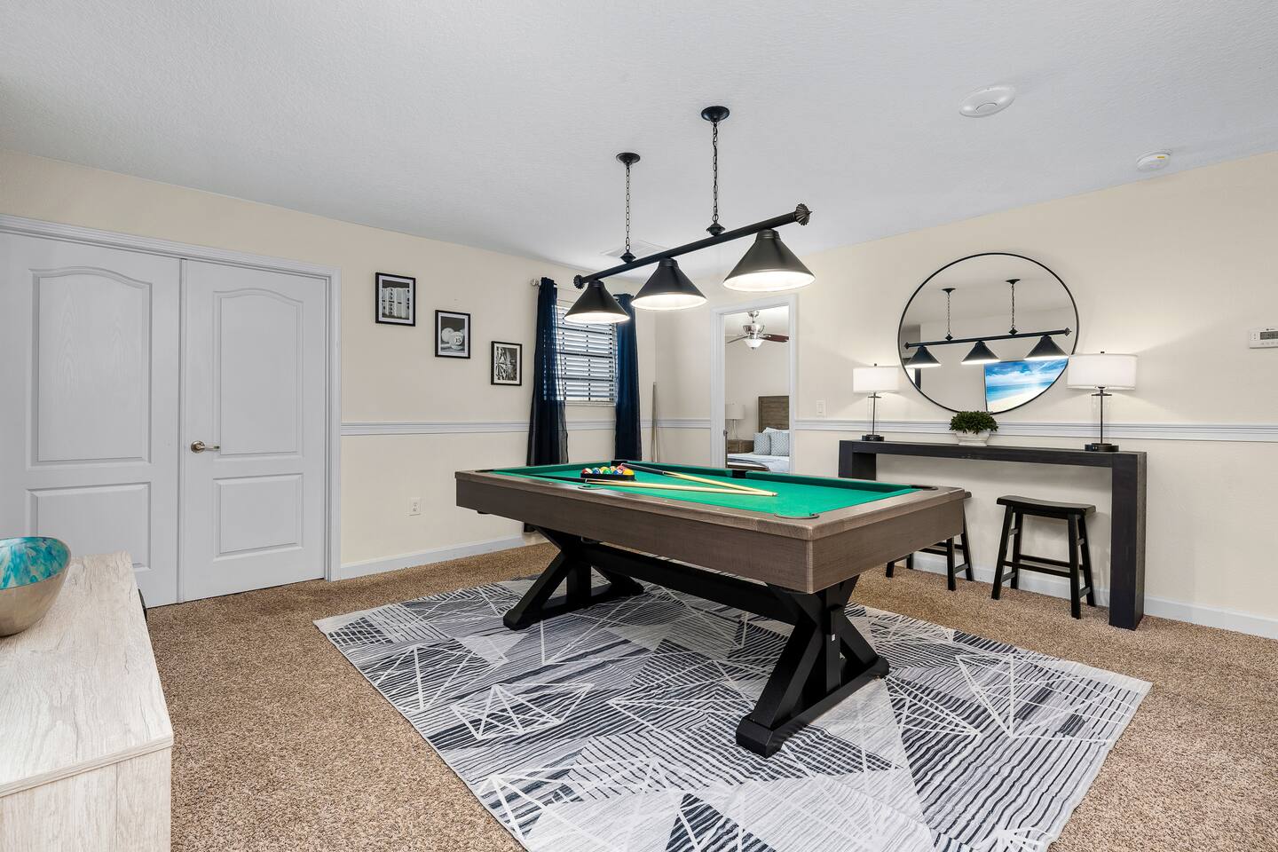 Unleash your inner champion at the stylish pool table and relax in vibrant decor