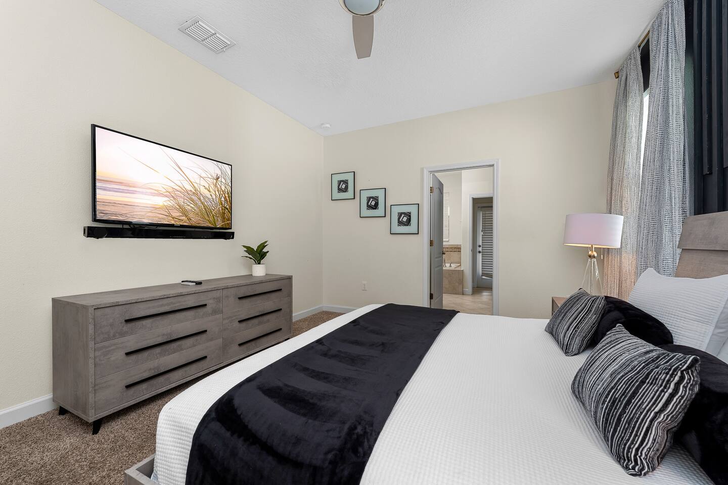 Relax in style with plush bedding, sleek decor, and a view of tranquility!