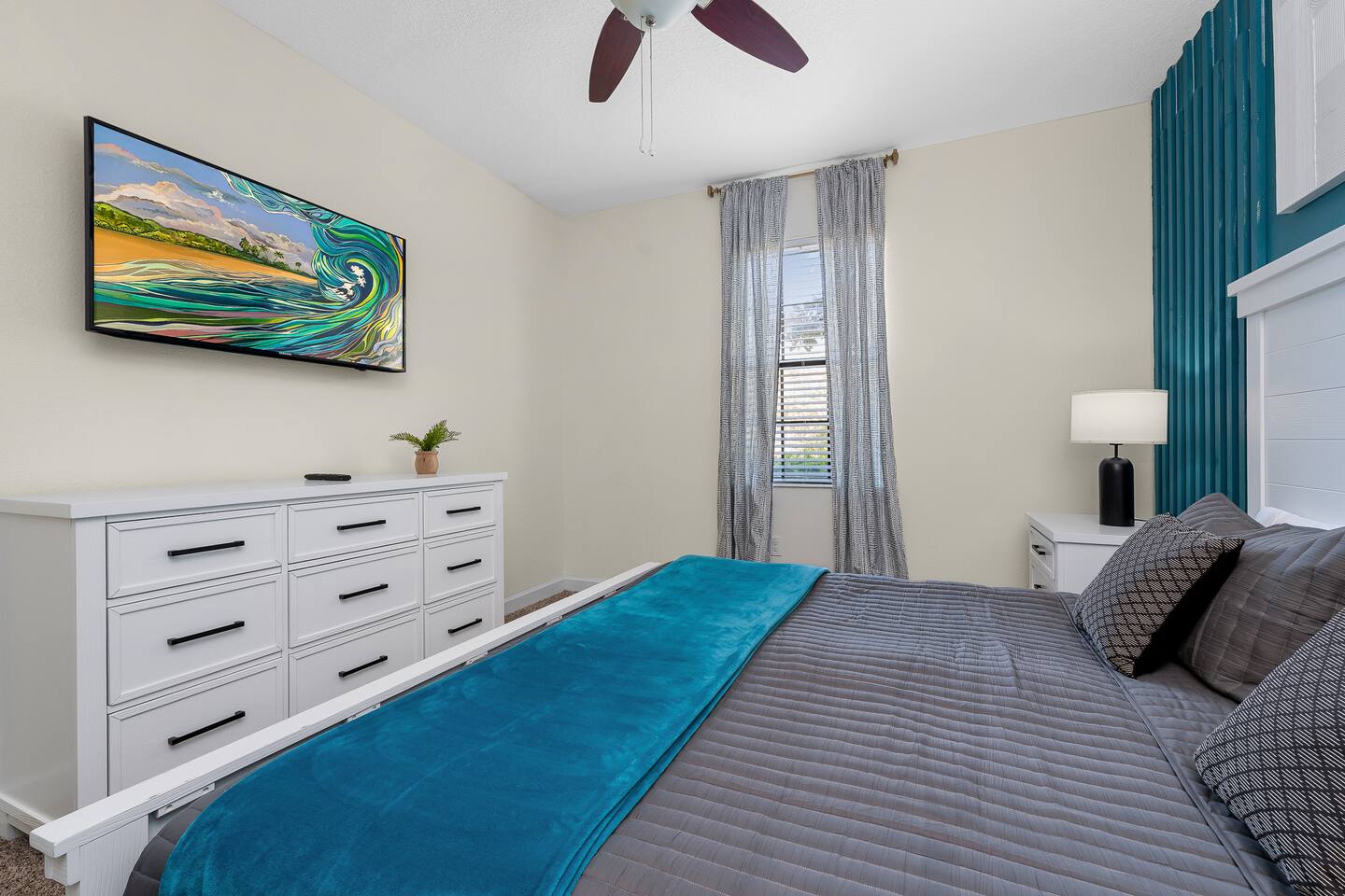 Unwind in style with vibrant decor, plush bedding, and bright natural light!