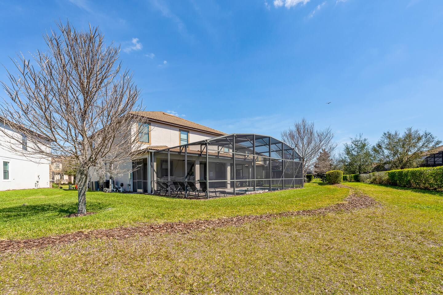 Enjoy sunny days by the spacious patio, perfect for lounging and fun gatherings!