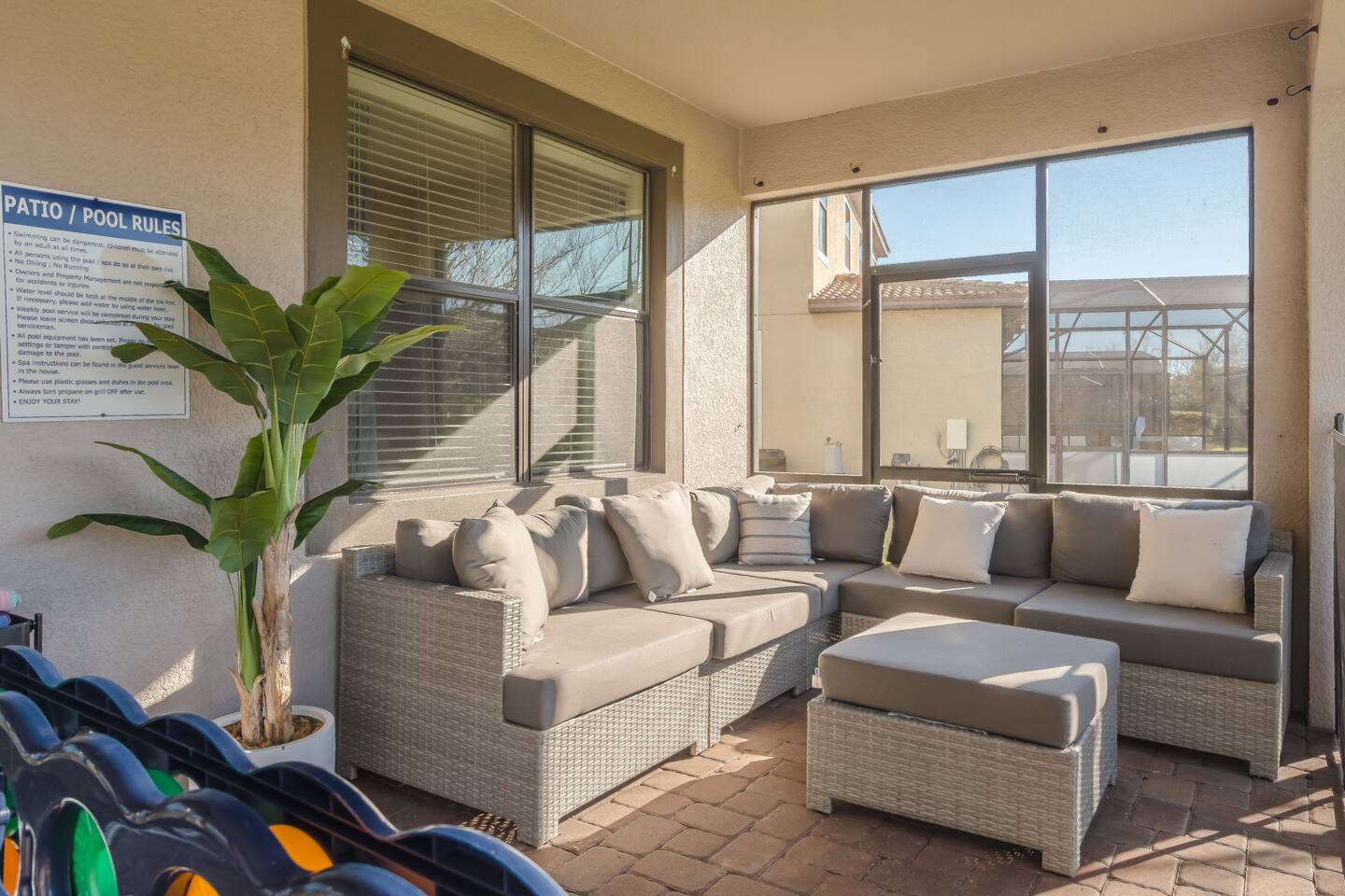 Comfortable outdoor sitting area with patio games like giant connect 4.